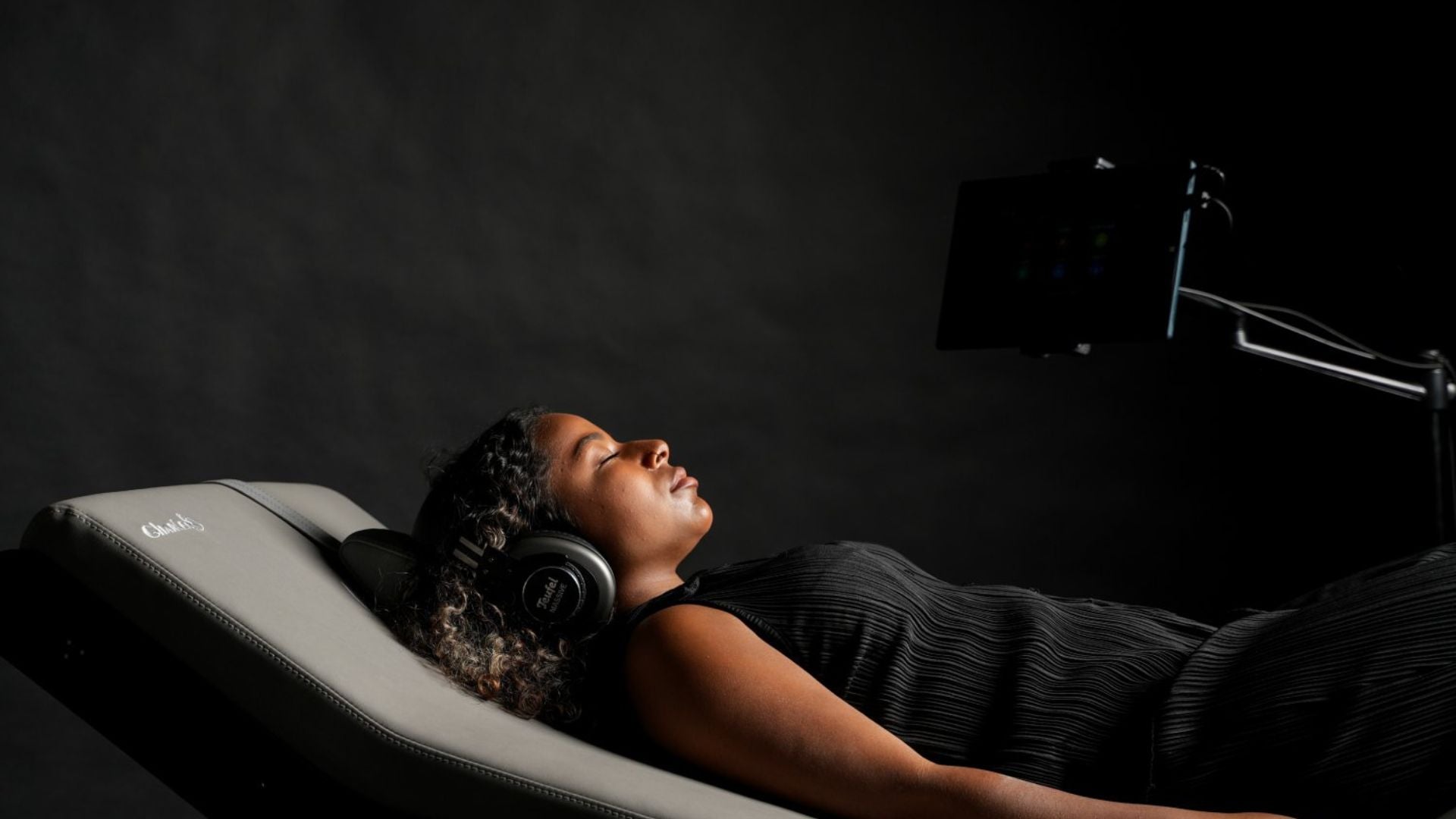 Model on RLX Satori Bed with Binaural Sound Treatment.